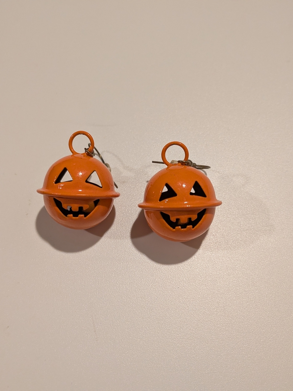 Vintage RUSS Orange Metal Pumpkin Jack-O'-Lantern Earrings With Bell